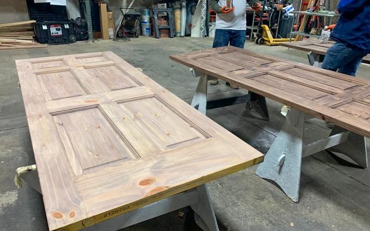 doors on the workshop are prepared for applying the primer